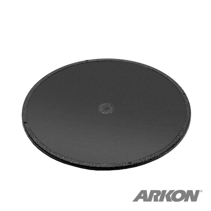 A round, flat 70mm black adhesive dash disk for 60mm suction mounts with a textured edge and central dot. Ideal for GPS mounting pedestals or dash mount discs; features the ARKON logo at the bottom right. Bulk Version of AP036.