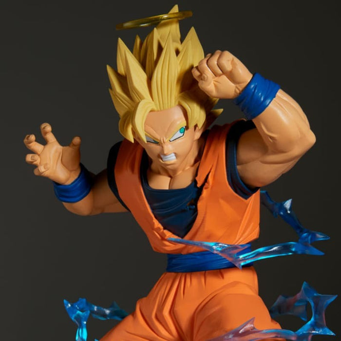 Action figure in orange and blue outfit with spiky hair on a dark background