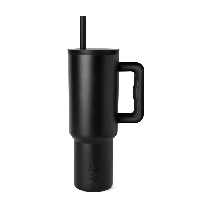 Matte black tumbler with gray tonal variations on white background