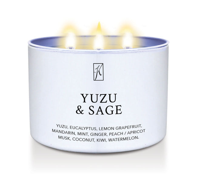 Candle in a white tin container labeled 'Yuzu & Sage' with a Kringle Candle logo on a white background
