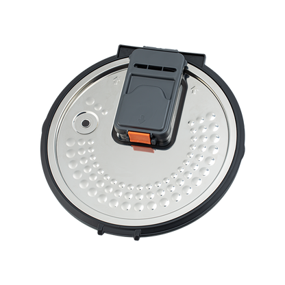 The removable metal inner lid of the Cosori Rice Cooker isolated on a white background