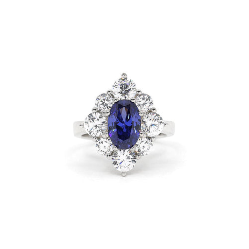 From the Victoria Collection by Anna Zuckerman, Elegant 1.5 carat sapphire blue crystalline oval in a halo of round diamond white round crystalline 5 tcw set in platinum plated sterling silver 925