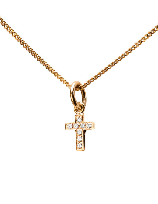 Liten berlock med ett diamant kors i 18k. guld