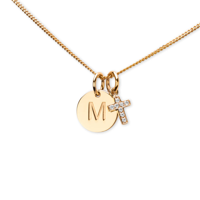 Guldkors med diamanter i kedja