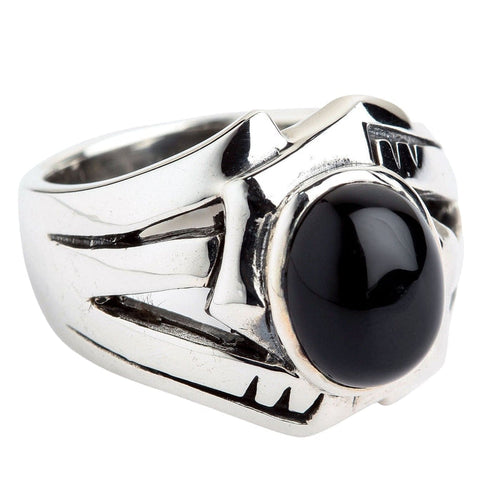 Front angled view of the Black Onyx Rocker Ring featuring a polished flat black stone set in a wide sterling silver frame.
