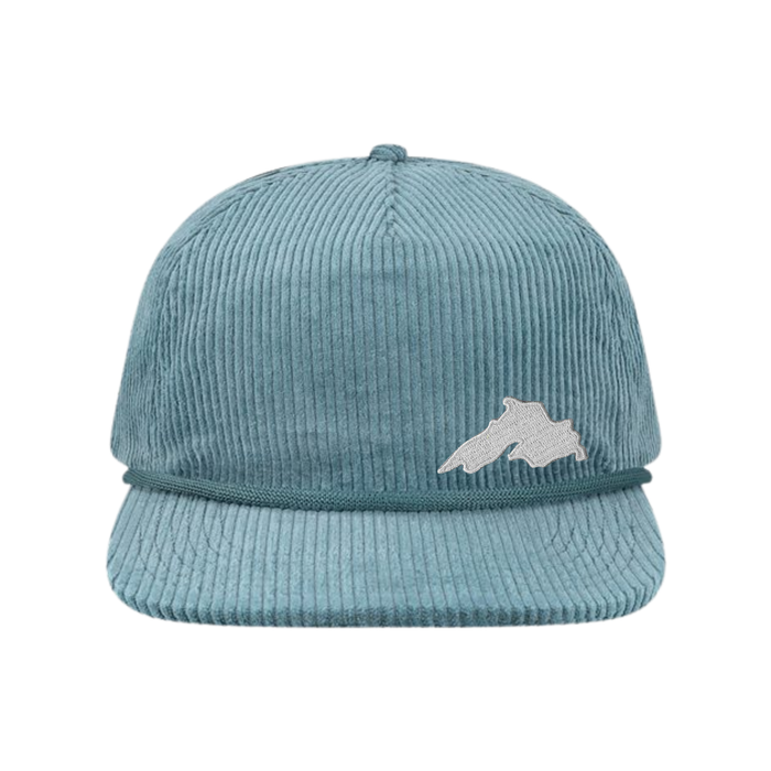 Blue Corduroy flat billed trucker hat with a silver embroidered patch of Lake Superior.