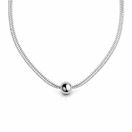 Silverhalsband till dam med dubbla kedjor som går genom en silverkula.