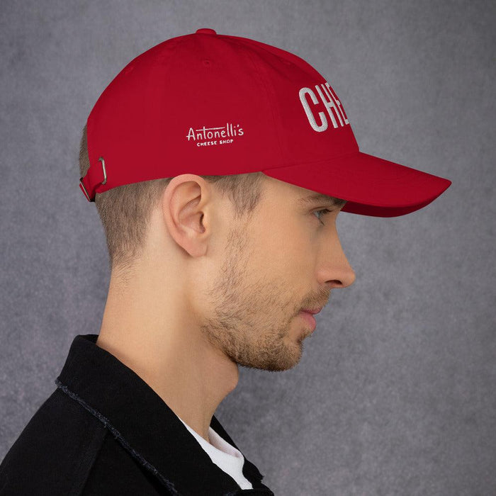 Red "CHEESE" Hat with adjustable strap and curved visor.
