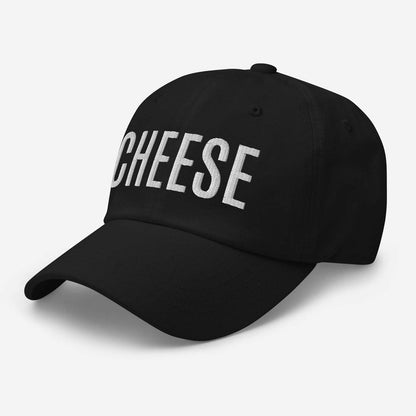 Black dad hat with "CHEESE" text, adjustable strap, curved visor.