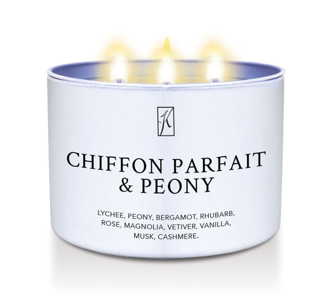 Candle in a white tin container labeled 'Chiffon Parfait & Peony' with a logo on a white background.