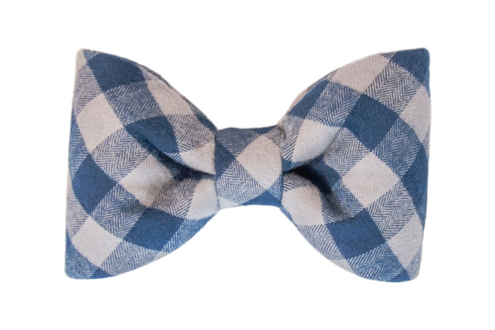 Classic dog bow tie in blue checks, offering a polished, preppy touch for everyday wear or special occasions.