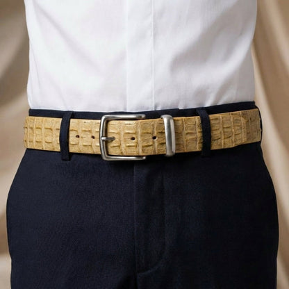 Men's cream crocodile leather belt styled with navy dress trousers and white shirt