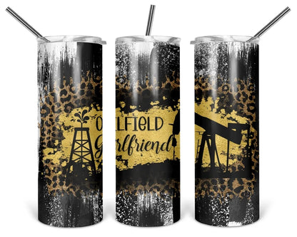 Crude Love and Leopard Print 20 oz tumbler with black, white, and gold distressed artwork, leopard print, oilfield equipment silhouettes, and Oilfield Girlfriend lettering.
