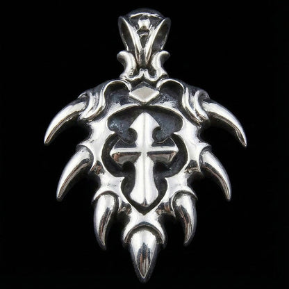 Front view of 925 sterling silver cross pendant with sharp tribal spikes