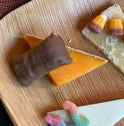 upclose image of cheese paired with halloween candy