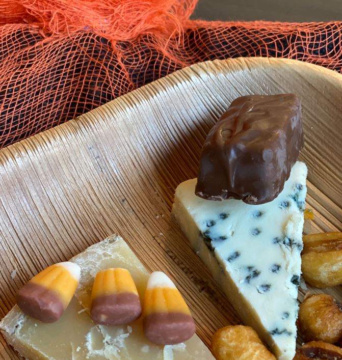 upclose image of cheese paired with halloween candy