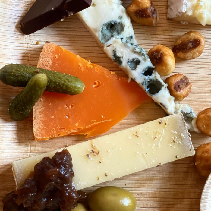 image of three cheeses and pairings