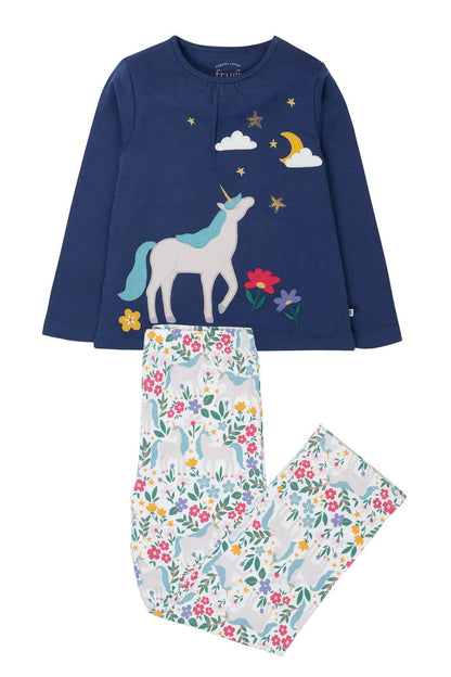 Children's pajama set with unicorn design on navy top and floral pants.
