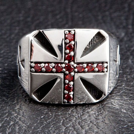 Front view of the men's sterling silver garnet cross ring, showing thirteen red garnets set across the Iron Cross face.