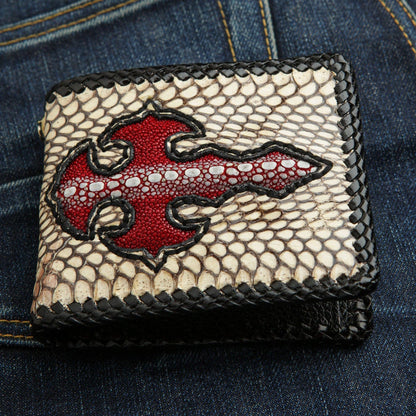 A men's gothic biker wallet, handcrafted from white cobra snakeskin with a red stingray leather cross inlay.