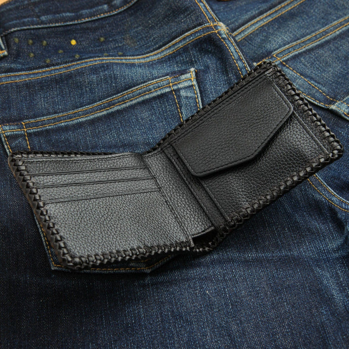 The interior of the gothic leather wallet, showing the card slots and coin pouch.