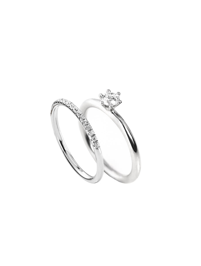 Par vigselring och förlovningsring med diamanter. Alliansring + solitärring 0,25 ct.