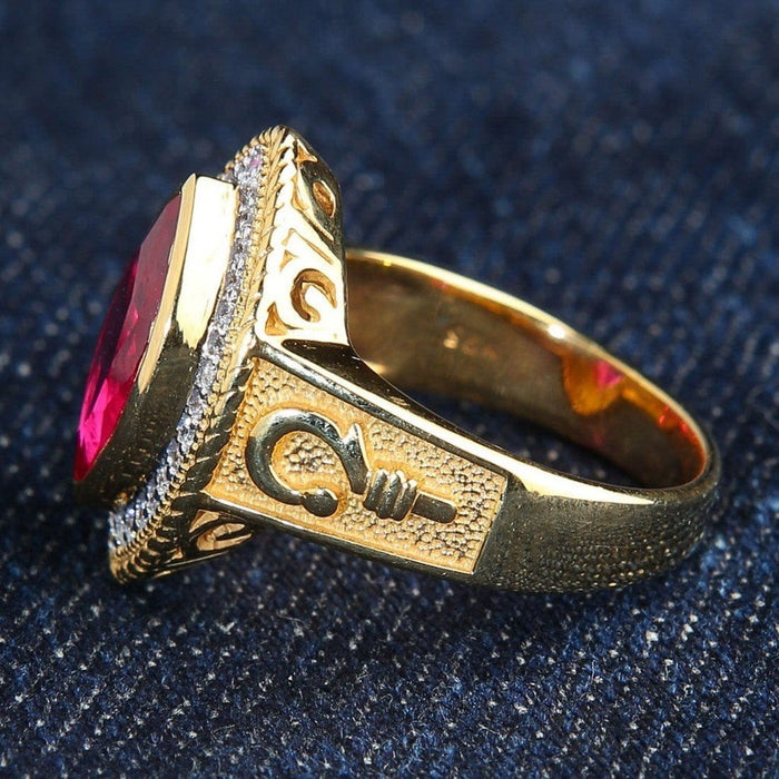 Profile showcasing gallery cutouts, a stippled gold shank with bishop staff emblem, and the inner 925 silver hallmark.