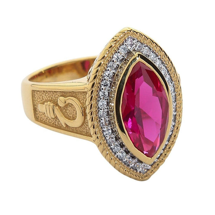 Classic 3/4 angle emphasizing the rope-edged halo surrounding a deep red marquise ruby and the gold side crosier detail.