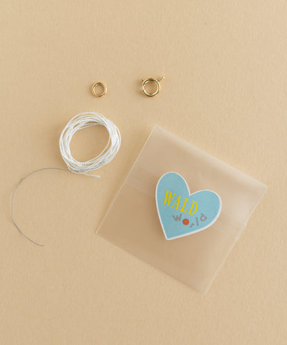 A jewelry kit featuring a WALD World Necklace and Bracelet Crafting Kit with wires.