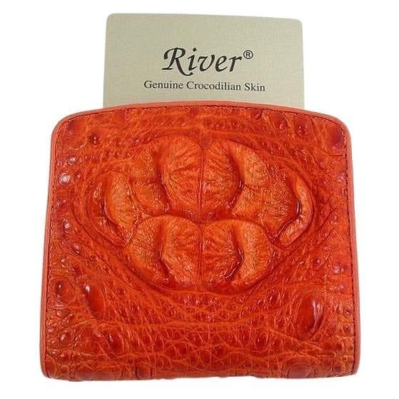 Orange genuine crocodilian hornback leather wallet by River with raised textured scales and papaya-amber tone