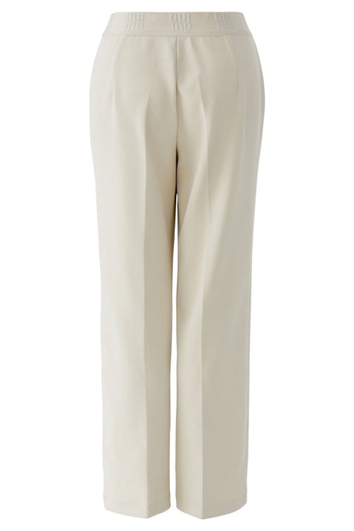 Beige pants on a white background