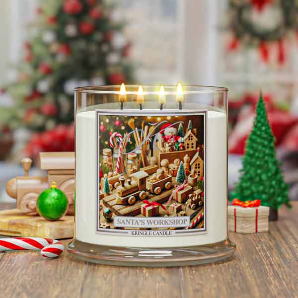 Kringle Candle with 'Santa's Workshop' design in a festive setting