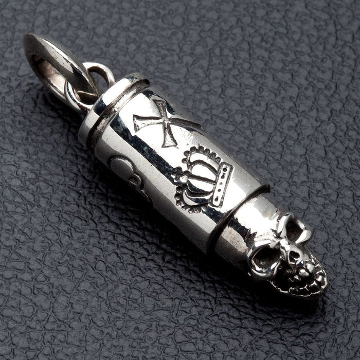 A premium gothic bullet necklace pendant, featuring a skull tip and a brilliant high-polish silver finish.