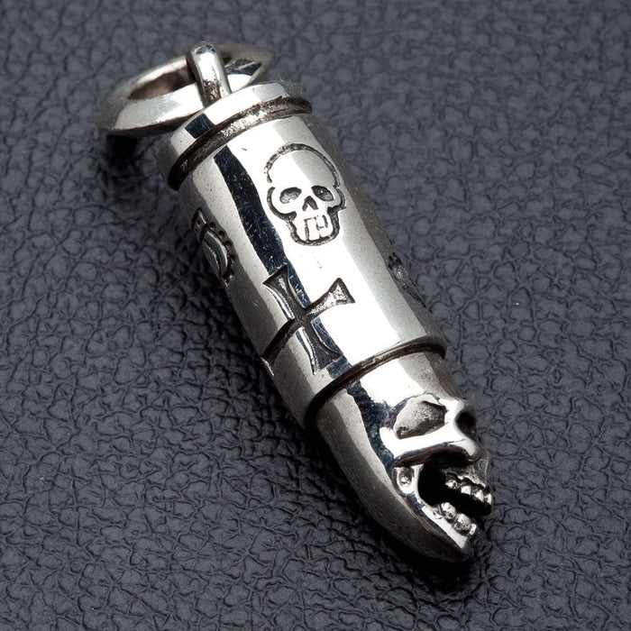 A classic biker-style skull bullet pendant, a powerful symbol of rebellion and personal sovereignty.