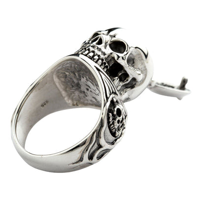 A unique and functional poison box ring with a detailed skull design, meticulously handcrafted from .925 sterling silver.