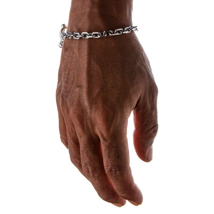 A front view of a man wearing the 6mm silver chain bracelet on his wrist.