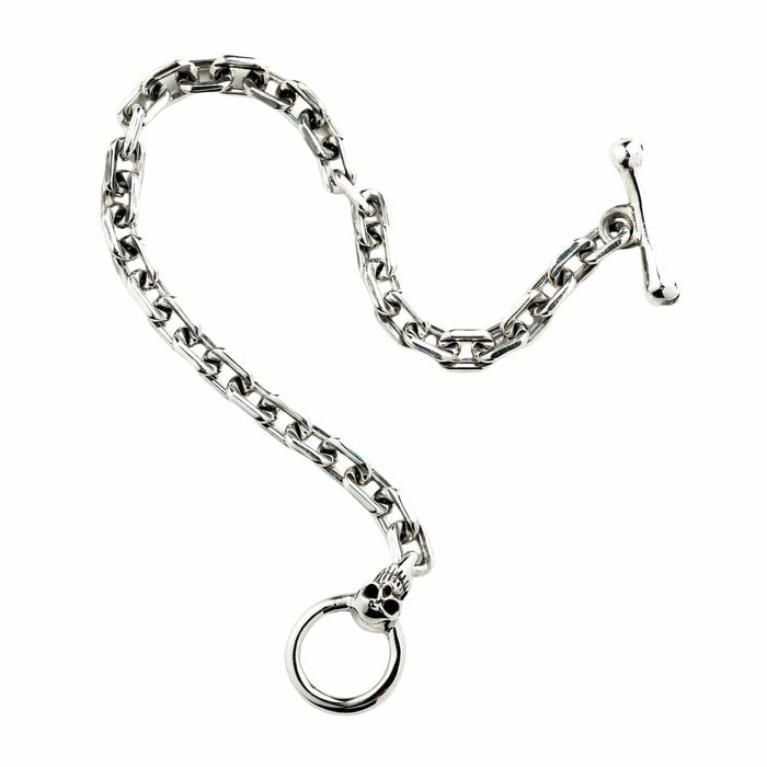 Detailed shot of the skull and bone T-bar clasp in an open position.
