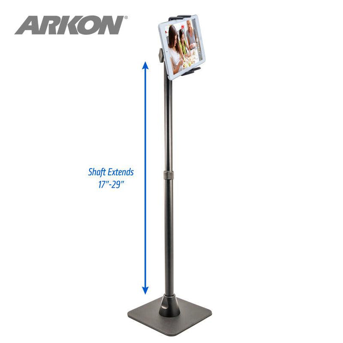 The Slim-Grip® Ultra iPad mini Desk Stand Tablet Holder features a square base and holds your tablet at the top. The shaft extends from 17 to 29 inches, as shown by a blue arrow. Perfect for live streaming, with the ARKON logo displayed in the top left corner.