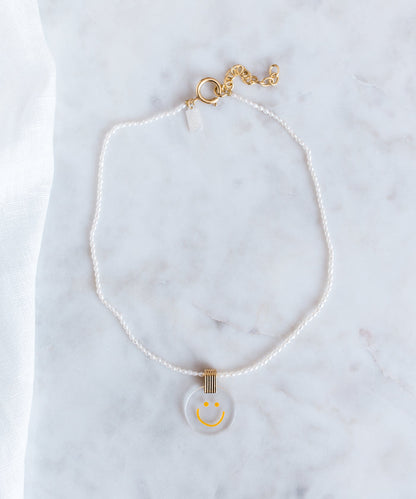 A Smilie Dude Pearl Medaillon Necklace from WALD Berlin, Germany's jewelry brand.