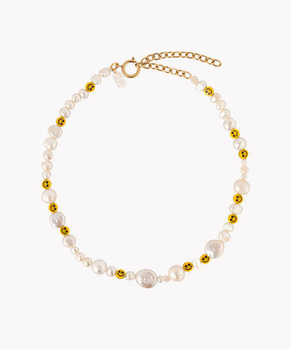 A Smilie Dude Pearl Necklace by WALD Berlin, a jewelry brand from Germany.