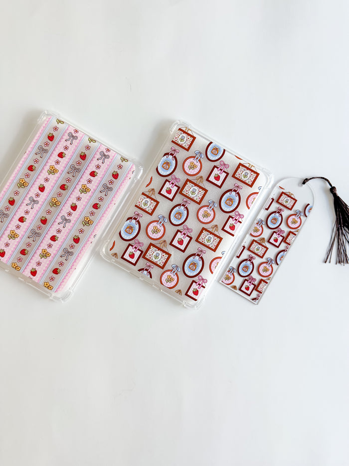 Two spring patterned kindle cases and one with a matching bookmark