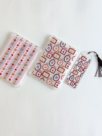 Two spring patterned kindle cases and one with a matching bookmark