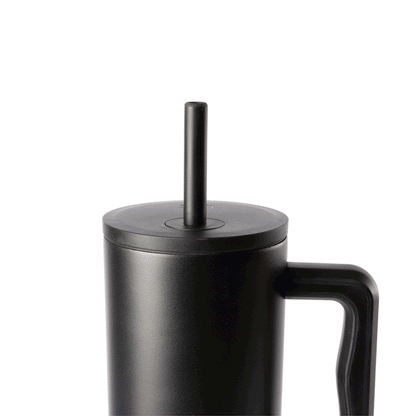 Trek Signature Pop-Lock bicycle lock mechanism demonstration in black and charcoal gray against neutral background