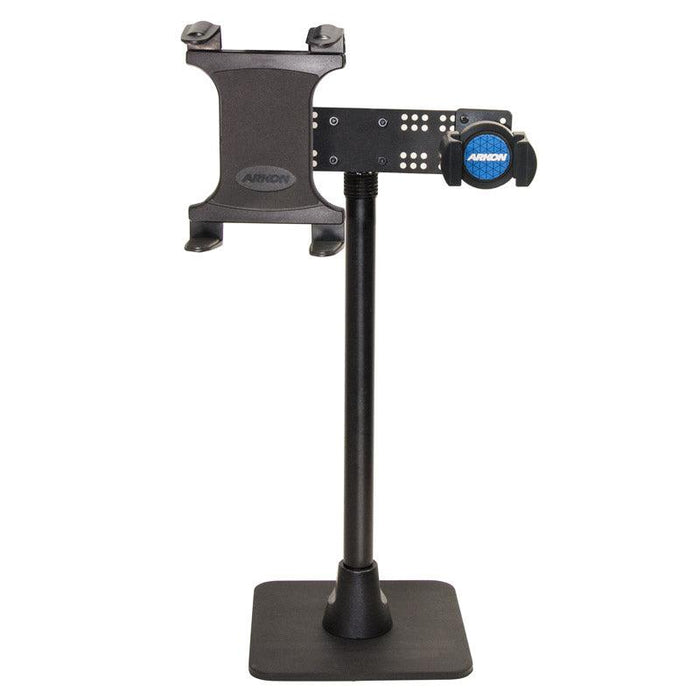 The TW Broadcaster Dual Slim-Grip® Tablet and RoadVise® Phone 29-inch Stand Holder is a black adjustable mount with a rectangular base and clamp, designed to securely hold your device upright for live streaming. Arkon branding is featured at the top.