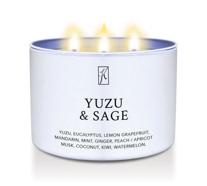 Candle in a white tin container labeled 'Yuzu & Sage' with a  Kringle Candle logo on a white background